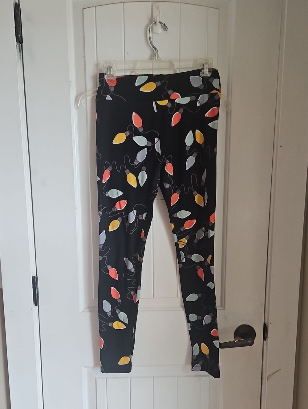 LuLaRoe Black Leggings with Red, Yellow, Gray, Cream Leaf Print